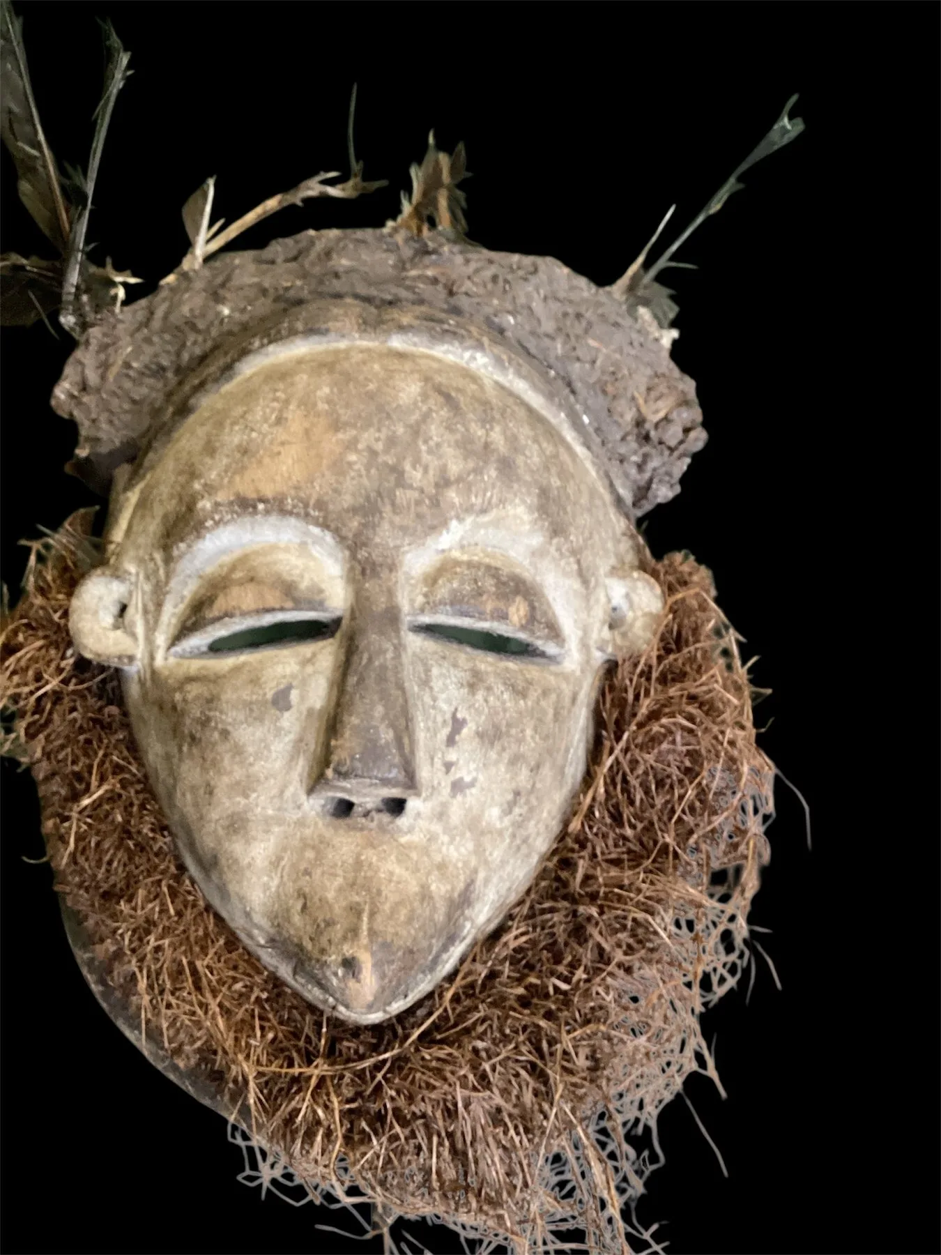 By hand made wooden traditional dance mask in Angoly